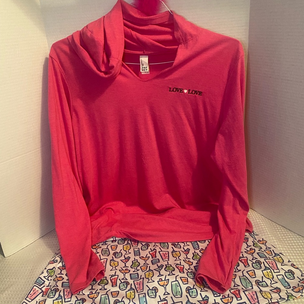 Pink Love Love Hoodie with Colorful happy hour Patterned pickleball skort.